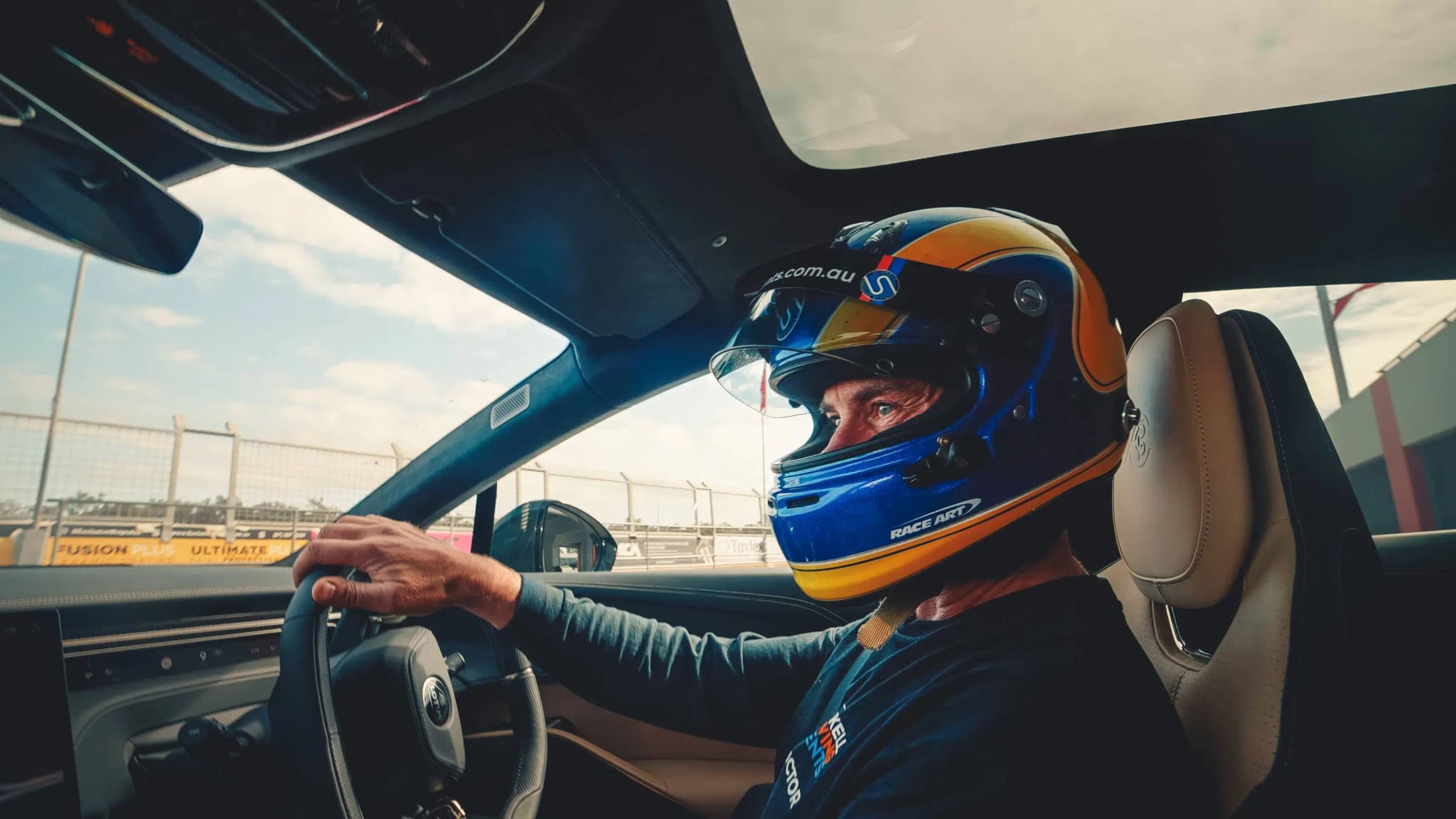 Race car driver helmet focus track experience